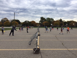 Mr Almachy’s 3rd-hour gym class plays paddle tennis outside.