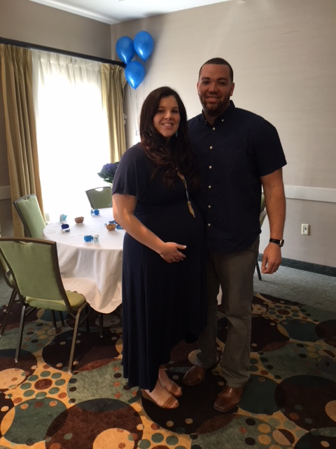 Mr. and Mrs. Bridges at their baby shower for their first child. 