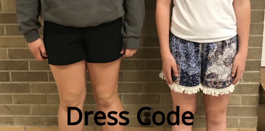 Chloe Pangborn and Brooke McCollum wearing shorts in school. 
