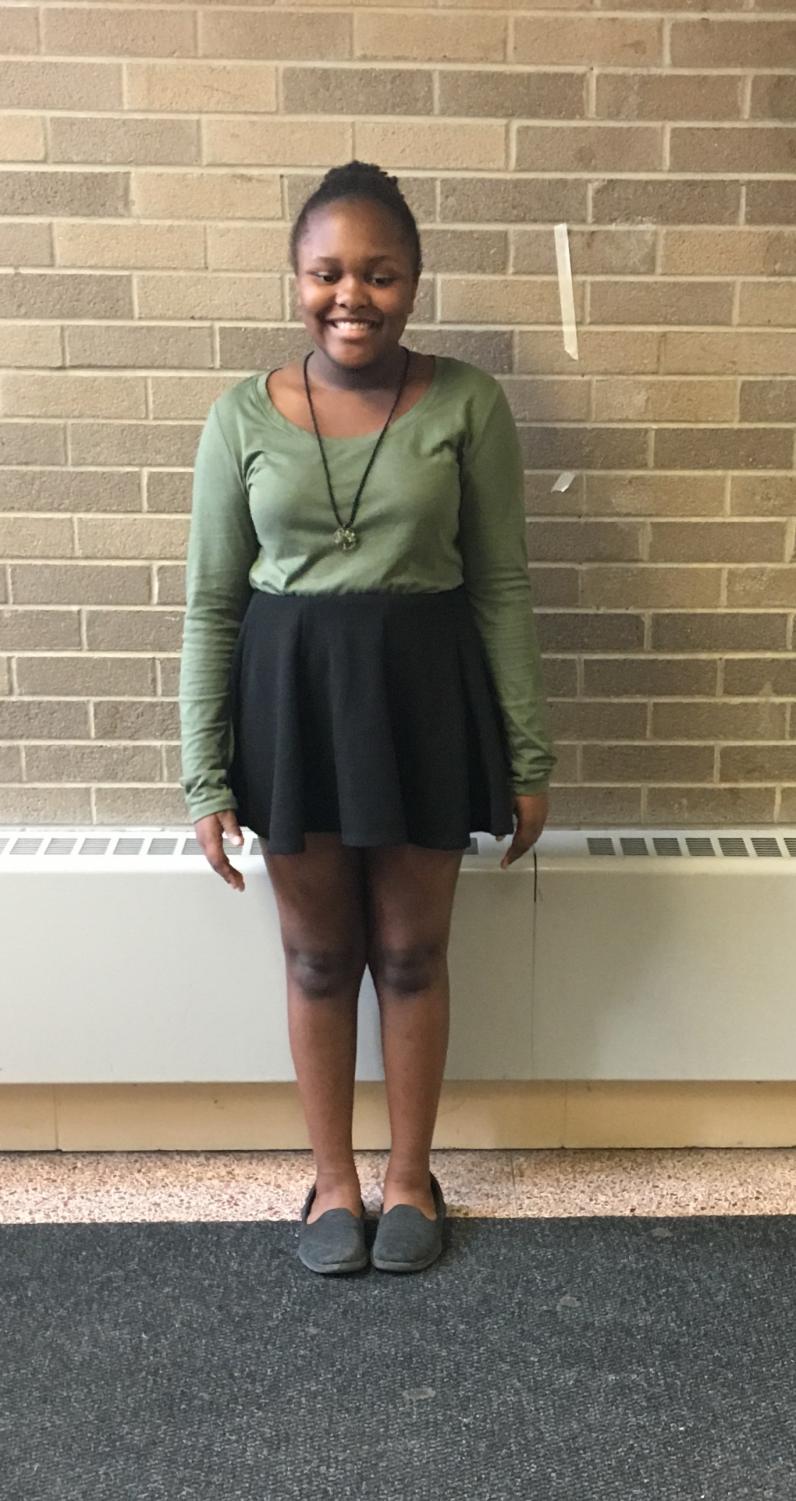 Nailah Spencer, seventh grade journalist, is wearing a skirt that does not follow our school's dress code.