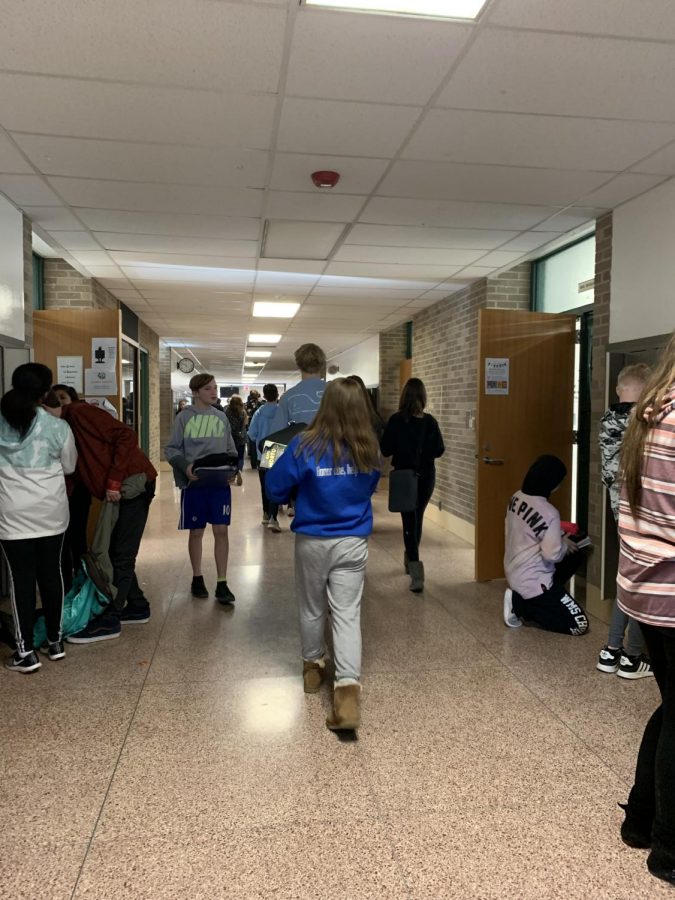 Students during passing time in C-Wing hallway. 