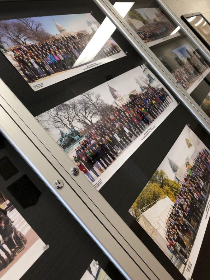 Photographs from previous Washington D.C. trips hanging in the counselor hallway. 