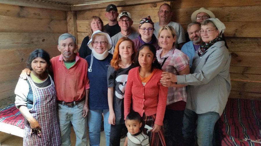 A team in Chi Chi Casinago Guatemala with the family they just finished building a house for.