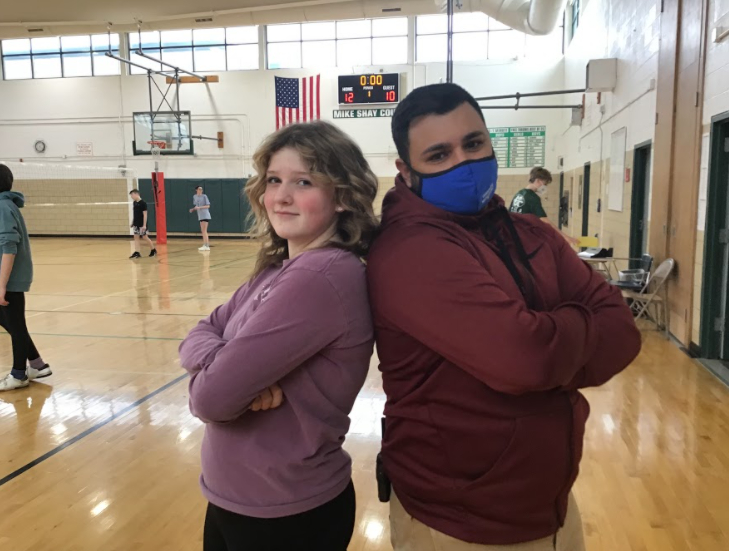 West educator wearing a mask and West student not wearing a mask.