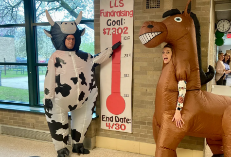 Mr. Smiley and Mrs. Kulczycki in inflatable farm animal costumes