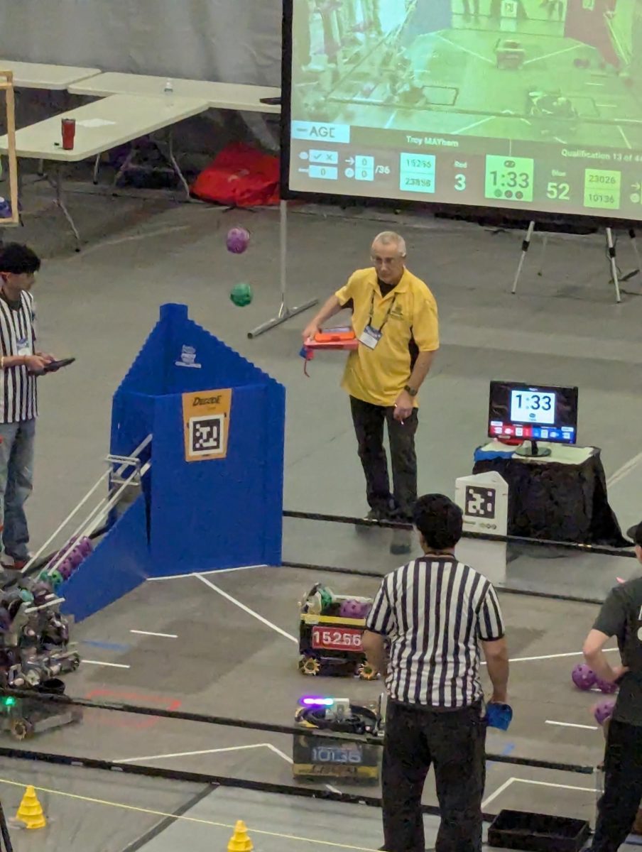 A match of the 2026 Troy MAYhem robotics competition